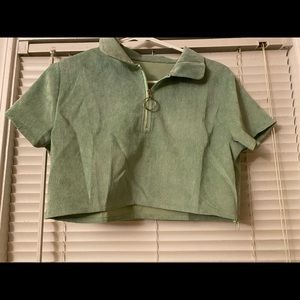 Mint green Kiki’s Kinis crop top